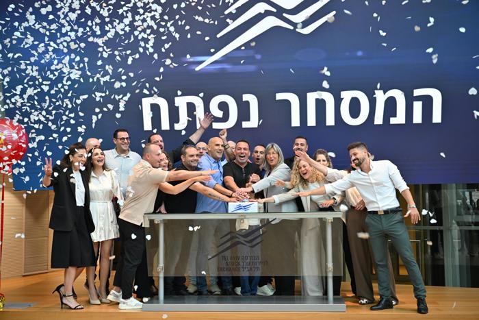 In the photo: Management and Board of Directors of Max Stock and representatives of TASE
