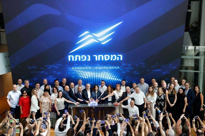 In the photo: Senior executives representing companies participating in the opening bell ceremony. Photo credit: Guy Yechiely